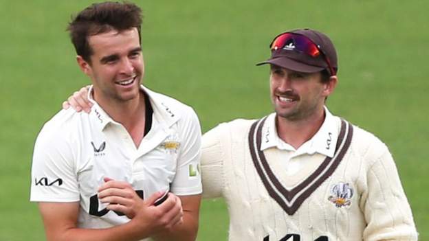 County Championship: Late burst of wickets gives Surrey leaders momentum against Northamptonshire
