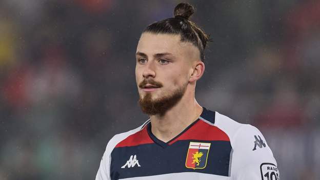 Tottenham sign Romania defender Dragusin from Genoa