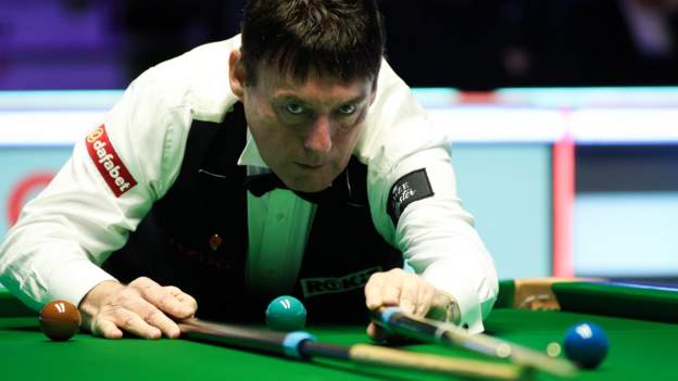 White reaches last 16 of German Masters