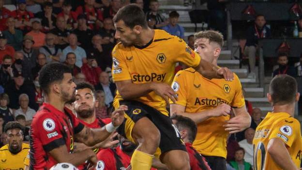 Bournemouth out of bottom three with win at Wolves