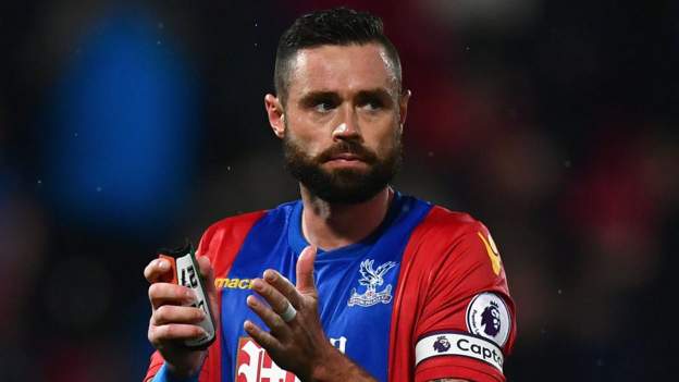 Damien Delaney confronted by Crystal Palace fan during loss to