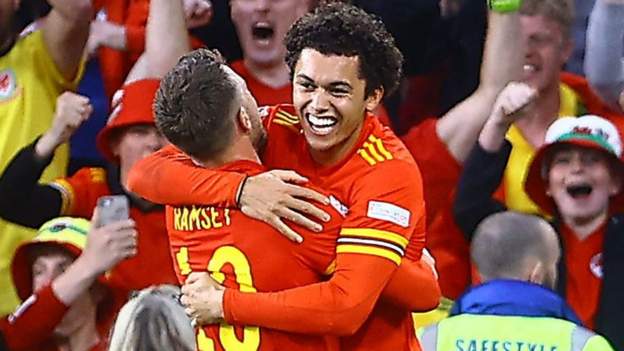 Johnson strikes late as Wales draw with Belgium