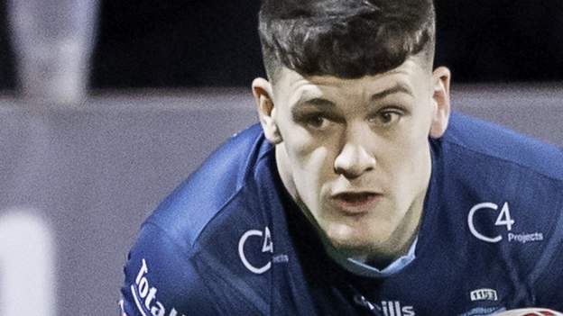 Warrington survive red card to win at Catalans