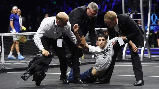Laver Cup: Protester appears to set arm on fire after entering the court