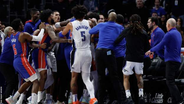 Eleven players suspended after mass scuffle