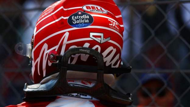Leclerc helmet breaks record at flood relief auction