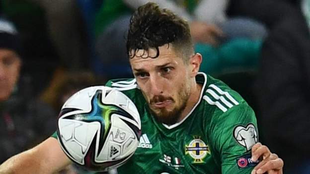 Northern Ireland defender Cathcart retires at 34