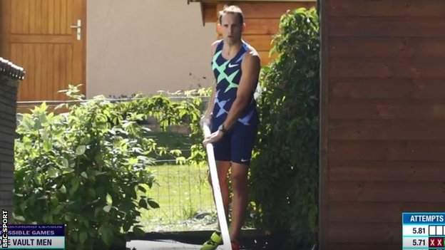 Renaud Lavillenie prepares to vault in his garden