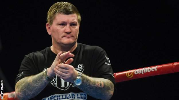 Former world champion Ricky Hatton, now a trainer, applauds his fighter