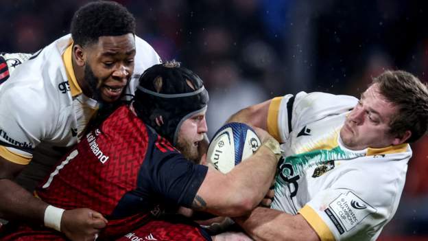 Munster through despite defeat by 14-man Northampton