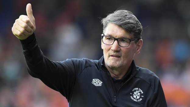 Mick Harford: Luton Town assistant boss resumes role following cancer treatment