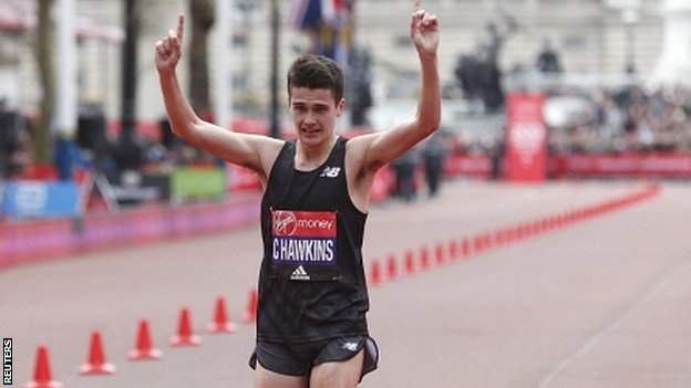 Callum Hawkins crosses the finish line at the London Marathon