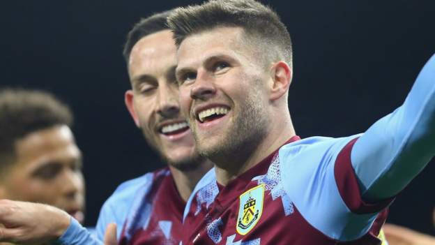 Burnley celebrate promotion with win over Blades