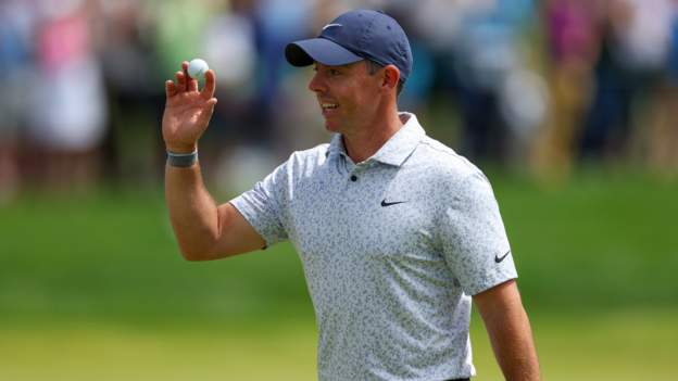 McIlroy makes first PGA Tour hole-in-one but trails by eight
