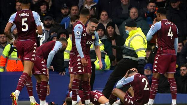 Villa players hit by bottle at Everton