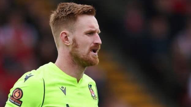Christian Dibble: Goalkeeper leaves Wrexham after five and a half