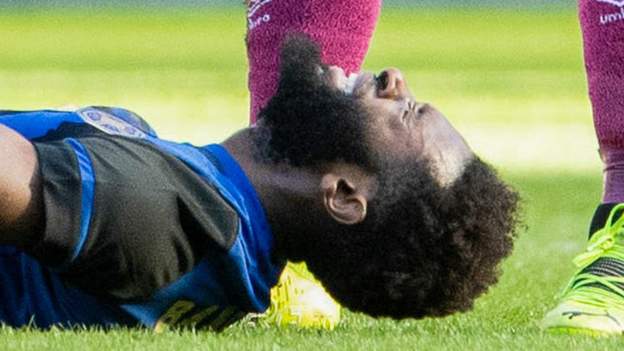 Beni Baningime: Hearts midfielder out until next season with cruciate injury
