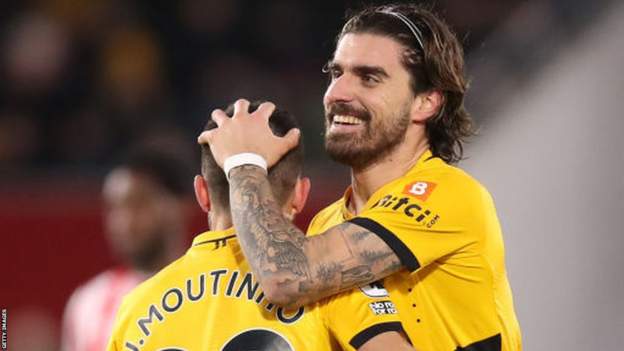 Brentford 1-2 Wolverhampton Wanderers: Ruben Neves earns win after drone stops play