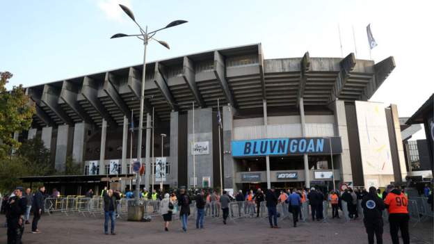 Man City fan attack: Two remain in custody after five men appear in court