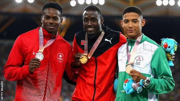 Leon Reid (right) alongside Canada's Aaron Brown and Trinidad & Tobago's gold medallist Hereem Richards on the Commonwealth Games podium