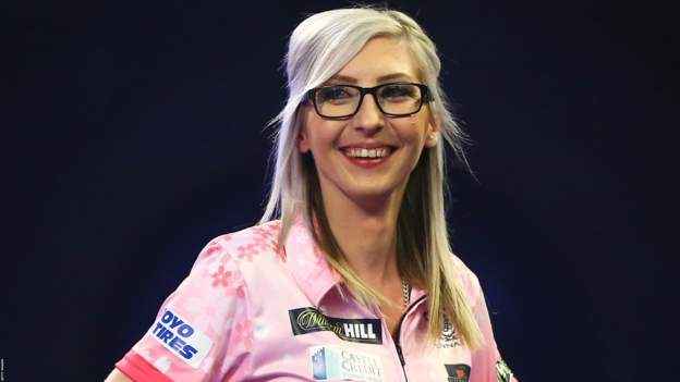 Fallon Sherrock is first woman to reach last 16 of Grand Slam of Darts