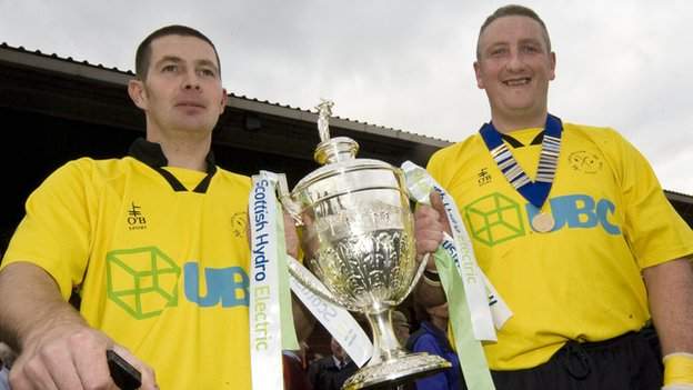 Victor Smith and James Clark (right) celebrate Fort William's cup success in 2007