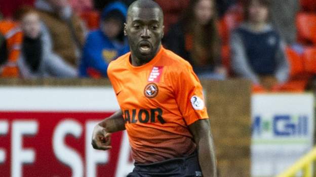 Hearts snap up former Dundee United midfielder Morgaro Gomis - BBC Sport