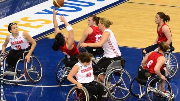 Great Britain take a shot in their final poll game against Canada.