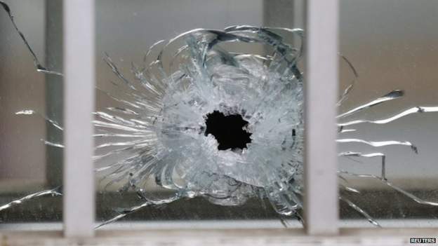 A bullet hole in a Paris building following the attack on the Charlie Hebdo office