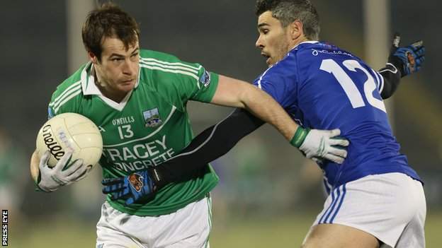Fermanagh forward Ruairi Corrigan is tackled by Cavan's Mark McKeever in the semi-final