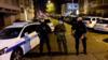 Полиция охраняет улицу после того, как греческий православный священник был ранен в церкви в центре Лиона, Франция, 31 октября 2020 г.