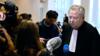 Французский адвокат семей жертв Оливье Морис беседует с журналистами в здании суда "Трибунал де Пари" в Париже, 15 июня 2020 г.