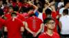 Поклонники Гонконга отворачиваются, когда звучит гимн Китая на матче против Малайзии, 1 ноября 2017 г.