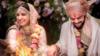 Болливудская актриса Анушка Шарма и индийский игрок в крикет Вират Кохли на свадебной церемонии в Буонковенто недалеко от Сиены, Италия, 11 декабря 2017 г.