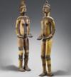 Деревянные предметы, мужской и женский, олицетворяют божеств общины игбо