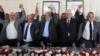 Слева направо: глава ХАМАС в секторе Газа Яхья Синвар, директор Палестинской общей разведки на Западном берегу Маджид Фарадж, политический лидер ХАМАС Исмаил Хания, премьер-министр Палестины Рами Хамдалла и египетский посредник держатся за руки во время встречи в городе Газа (2 октября 2017 г. )
