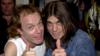 Участники группы AC / DC Ангус Янг, l (слева) и Малкольм Янг (15 сентября 2000 г.)