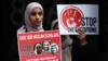Женщины протестуют перед консульством Саудовской Аравии в Нью-Йорке 1 июня 2019 года в знак протеста против судебных процессов над тремя священнослужителями в Саудовской Аравии