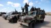Члены Ливийской национальной армии (ЛНА) под командованием Халифы Хафтара позируют для фото