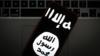 Логотип так называемого Исламского государства виден на мобильном телефоне