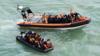 Мигранты на надувной лодке