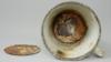 Чашка с двойным дном, найденная в музее Освенцима, 18 мая 2016 г., в которой скрываются драгоценности