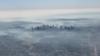 Вид с воздуха на Сидней, окутанный дымом