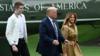 Президент США Дональд Трамп, первая леди Мелания и их сын Бэррон идут к Белому дому от Marine One в Вашингтоне, 16 августа 2020 г.