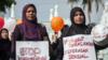 Индонезийские матери проводят акцию протеста против сексуального насилия над детьми в Банда-Ачех в 2014 году