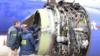 Следователи NTSB изучают повреждение двигателя самолета Southwest Airlines на этом снимке, сделанном из Филадельфии, штат Пенсильвания, 17 апреля 2018 г.