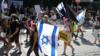 Люди протестуют в Иерусалиме перед голосованием в израильском парламенте по закону, позволяющему министрам сдерживать массовые протесты (29 сентября 2020 г.)