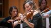 Скрипач Никола Бенедетти выступает с наставниками и послами Фонда Бенедетти для 350 молодых музыкантов на первых Сессиях Бенедетти в Королевском концертном зале Глазго.