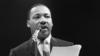 Священнослужитель и борец за гражданские права Мартин Лютер Кинг выступает с речью