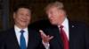 Президент США Дональд Трамп (справа) приветствует президента Китая Си Цзиньпина (слева) в поместье Мар-а-Лаго в Уэст-Палм-Бич, Флорида.